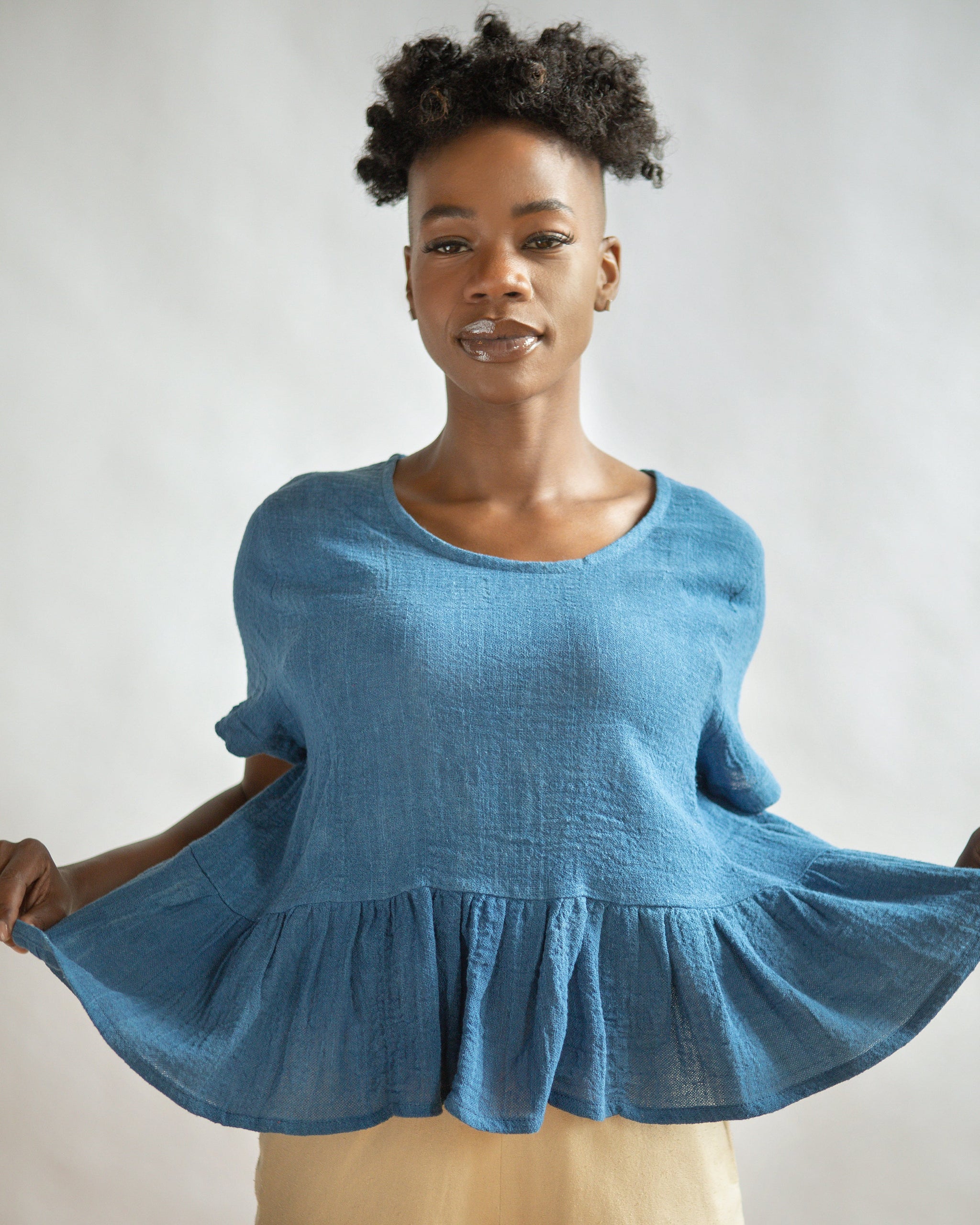 THE INDIGO OMBRE PEPLUM TOP