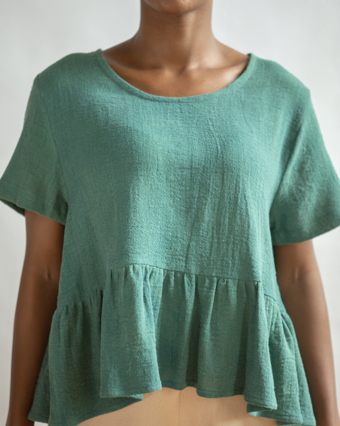 THE NATURALLY DYED PEPLUM TOP IN COTTON GAUZE