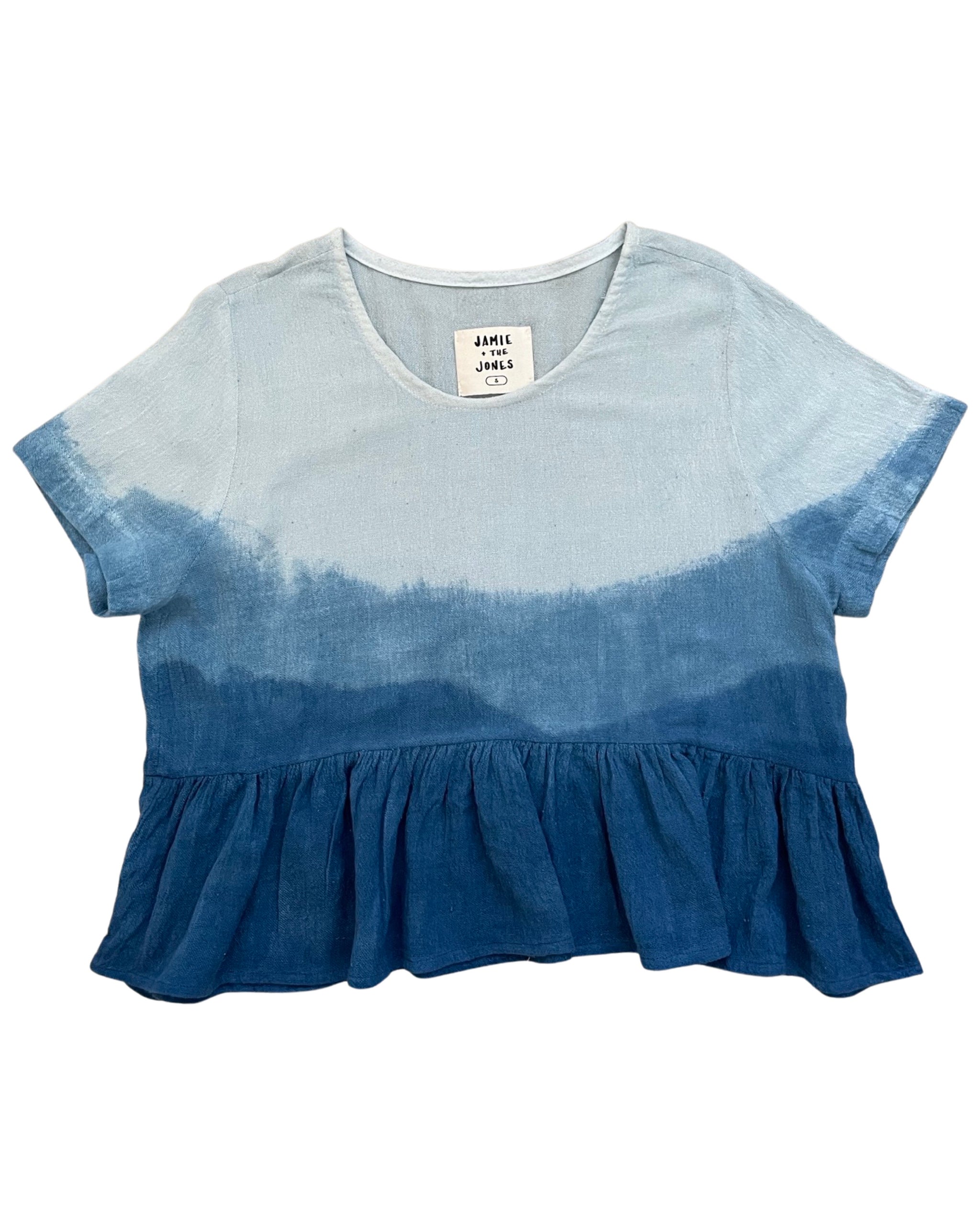 THE INDIGO OMBRE PEPLUM TOP